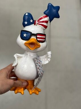 Patriotic Duck Figurine with Star Balloon - Red, White & Blue